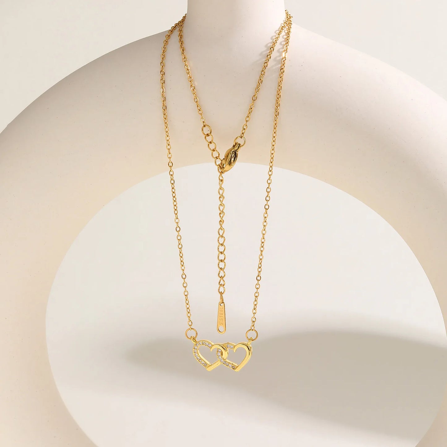 Zircon Interlocking Hearts Necklace