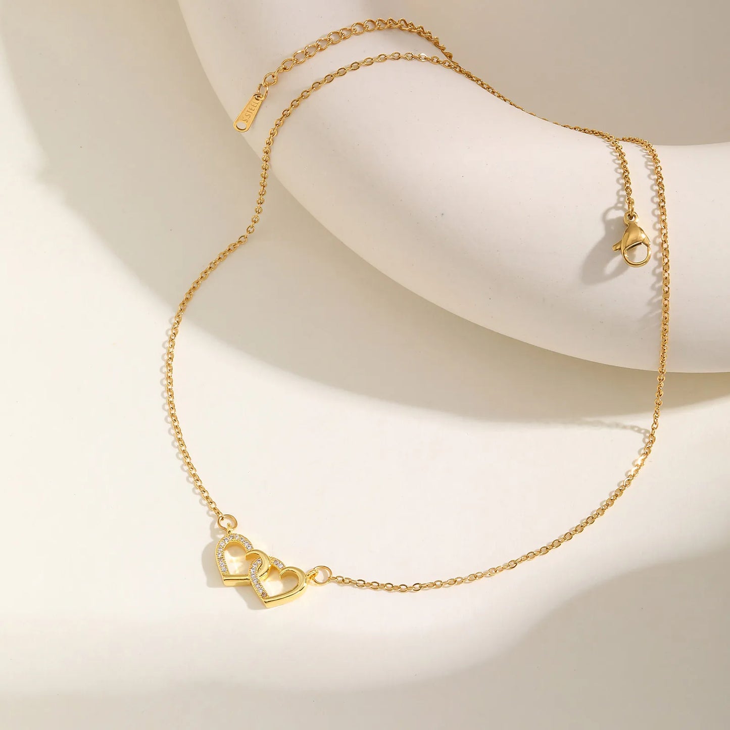 Zircon Interlocking Hearts Necklace