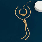 Long Tassel Cross Knot Necklace