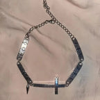 Spliced Cross Rivet Necklace