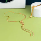 Long Tassel Cross Knot Necklace