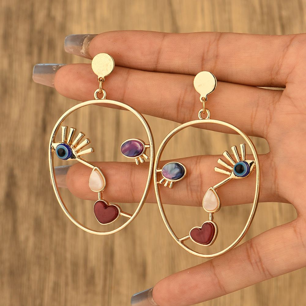 Hollow Abstract Evil Eye Earrings