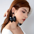 Black Padded Bow Drop Earrings