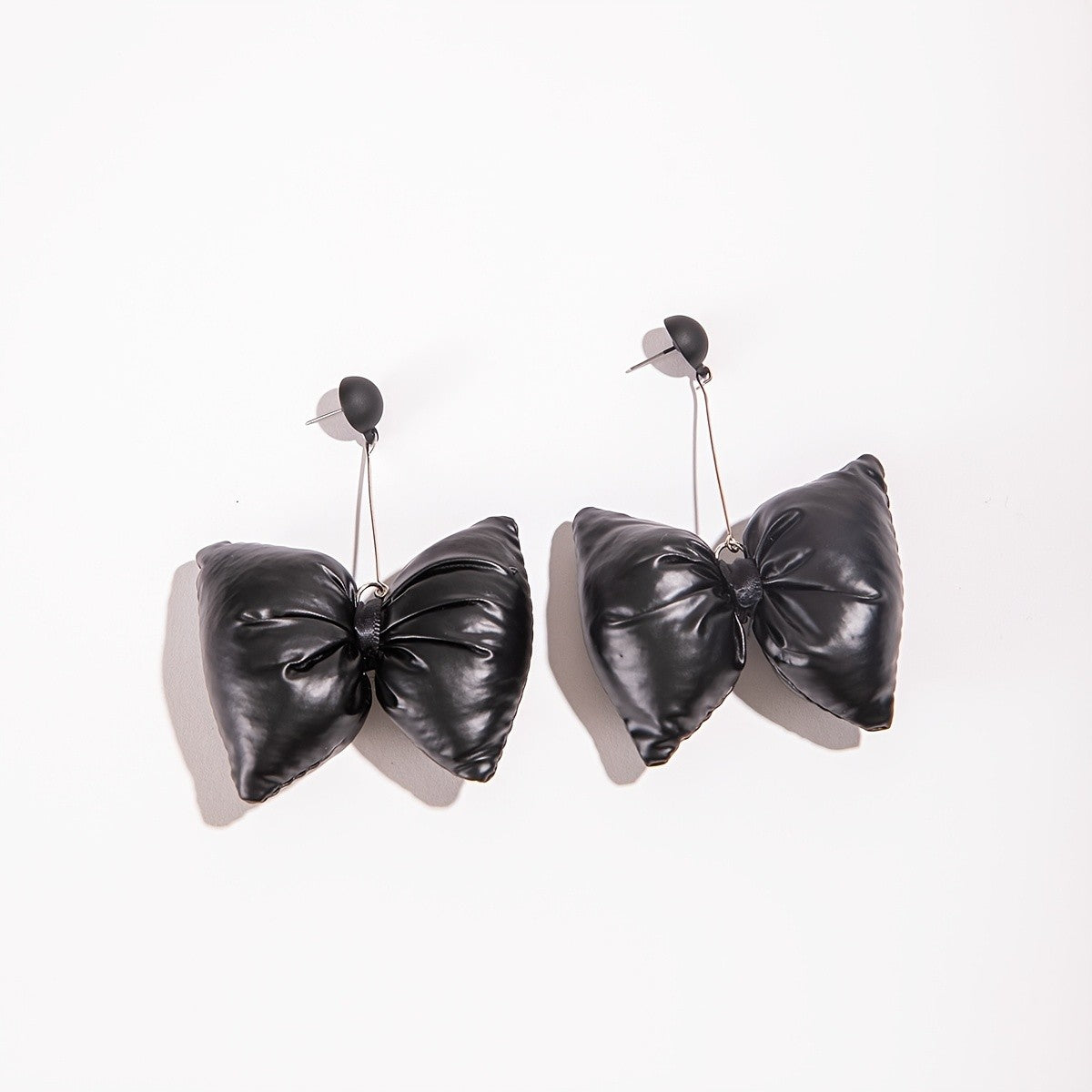 Black Padded Bow Drop Earrings
