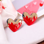 Melted Heart Stud Earrings