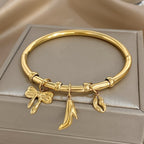 Charm Bangle with Bow and Heel Pendants