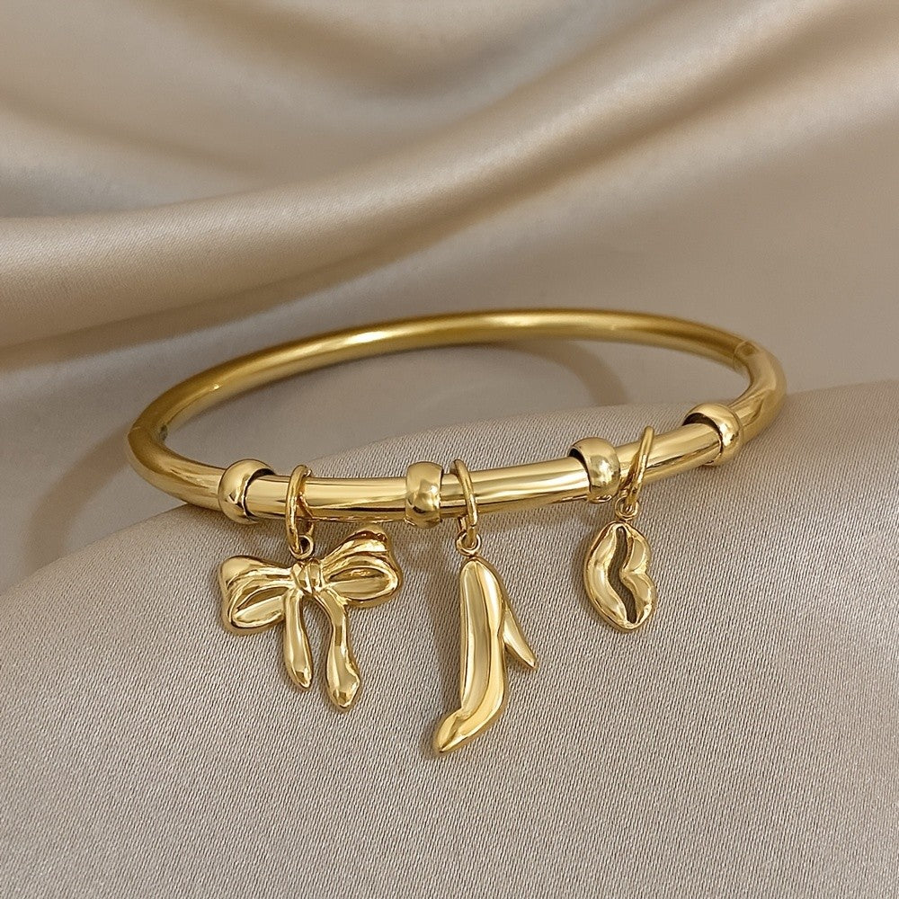 Charm Bangle with Bow and Heel Pendants