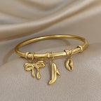 Charm Bangle with Bow and Heel Pendants