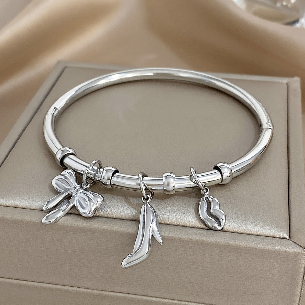 Charm Bangle with Bow and Heel Pendants