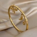 Charm Bangle with Bow and Heel Pendants