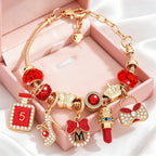 Adjustable Charm Bracelet with Bow and Crown