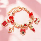 Adjustable Charm Bracelet with Bow and Crown