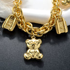 18k Bear and Lock Charm Chain Bracelet