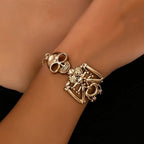 14k Skull & Bones Charm Bracelet