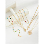 Layered Sun & Cross Pendant Necklace Set