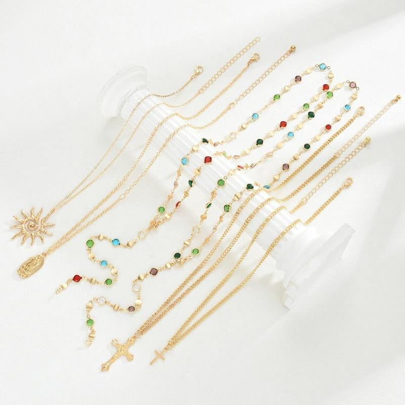 Layered Sun & Cross Pendant Necklace Set