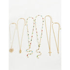 Layered Sun & Cross Pendant Necklace Set